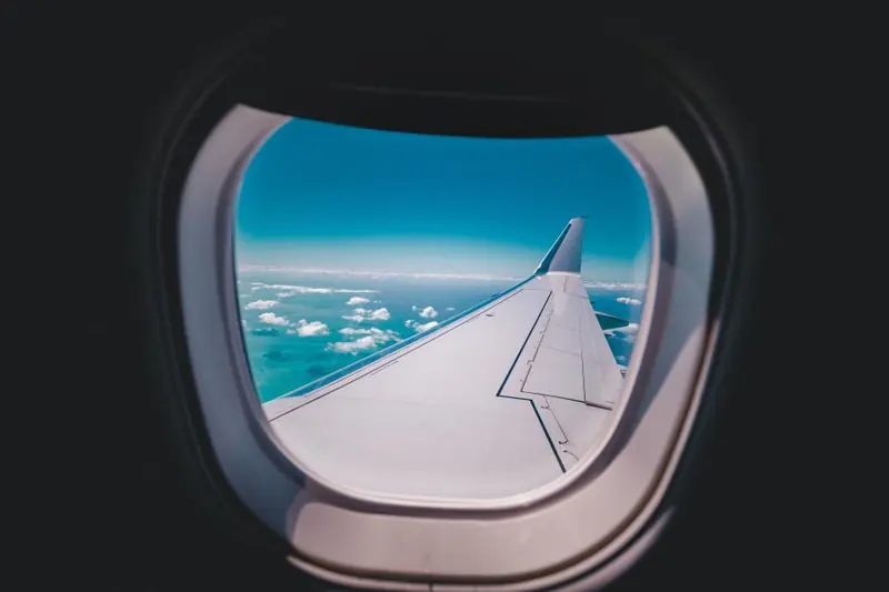 View of the clouds through an aeroplane window